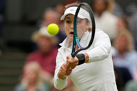 Anna Kalinskaya plays a backhand return to Elena Rybakina